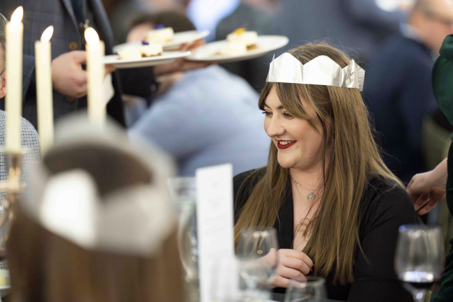 Christmas party guest smiling 